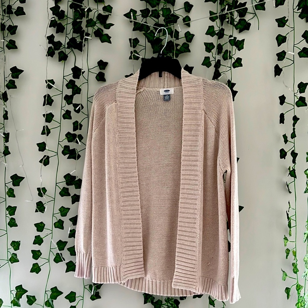 I am selling a cream colored cardigan. It is from Old Navy.